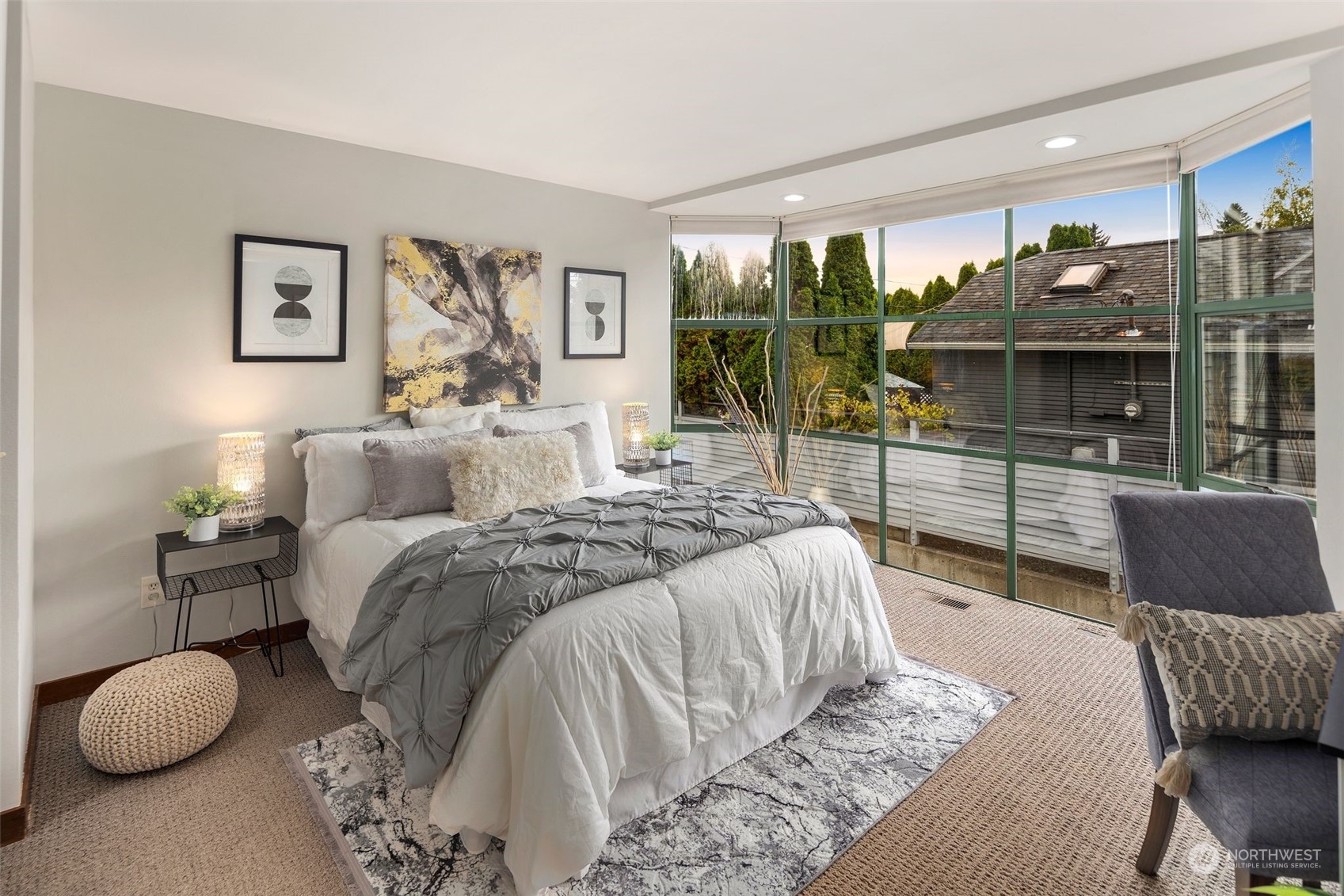 416 Daley Street, Unit C Edmonds, WA 98020 - Photo 14 of 38 a bedroom with a bed and glass windows