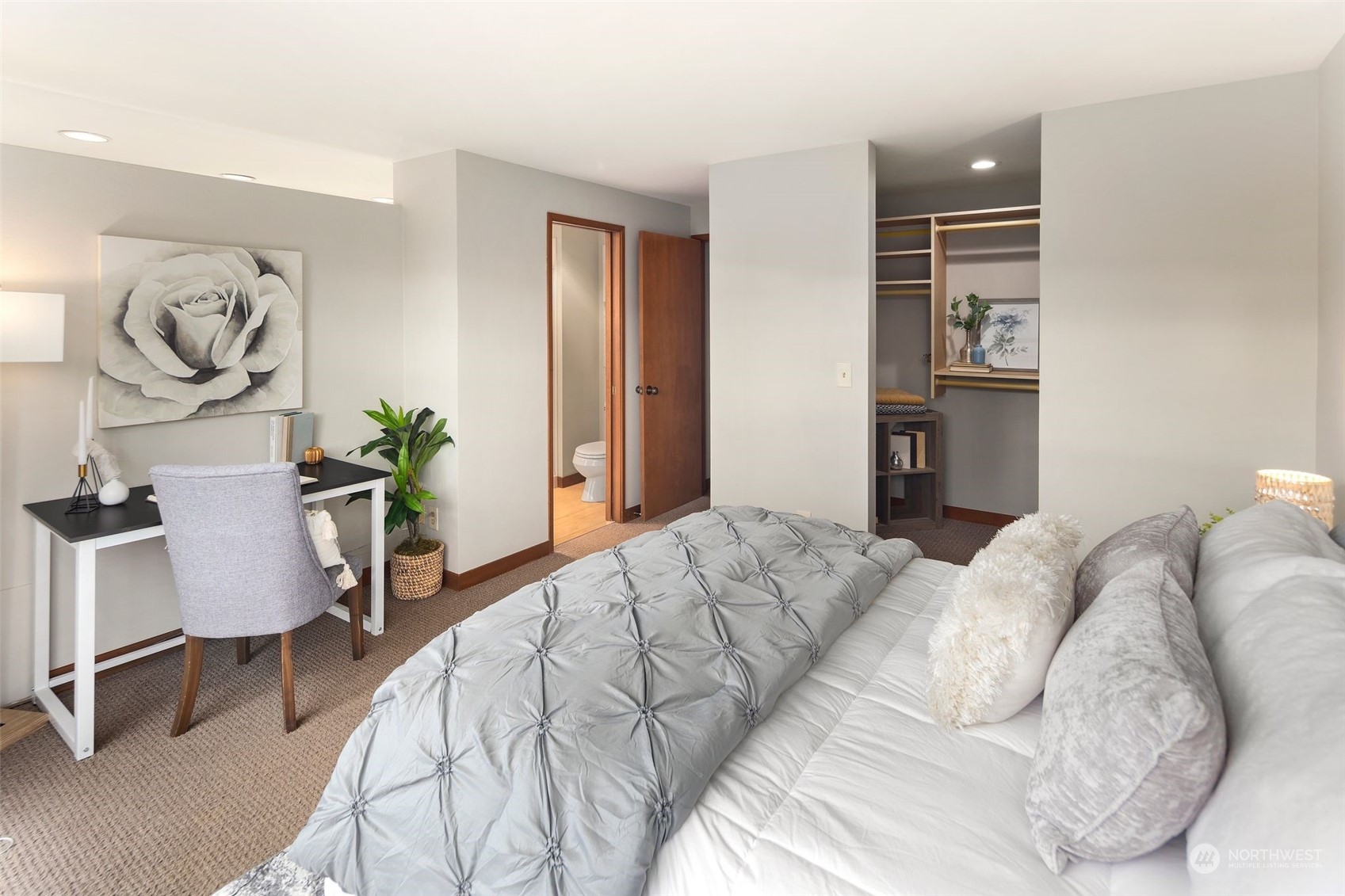 416 Daley Street, Unit C Edmonds, WA 98020 - Photo 16 of 38 a bedroom with a bed and a chair in it