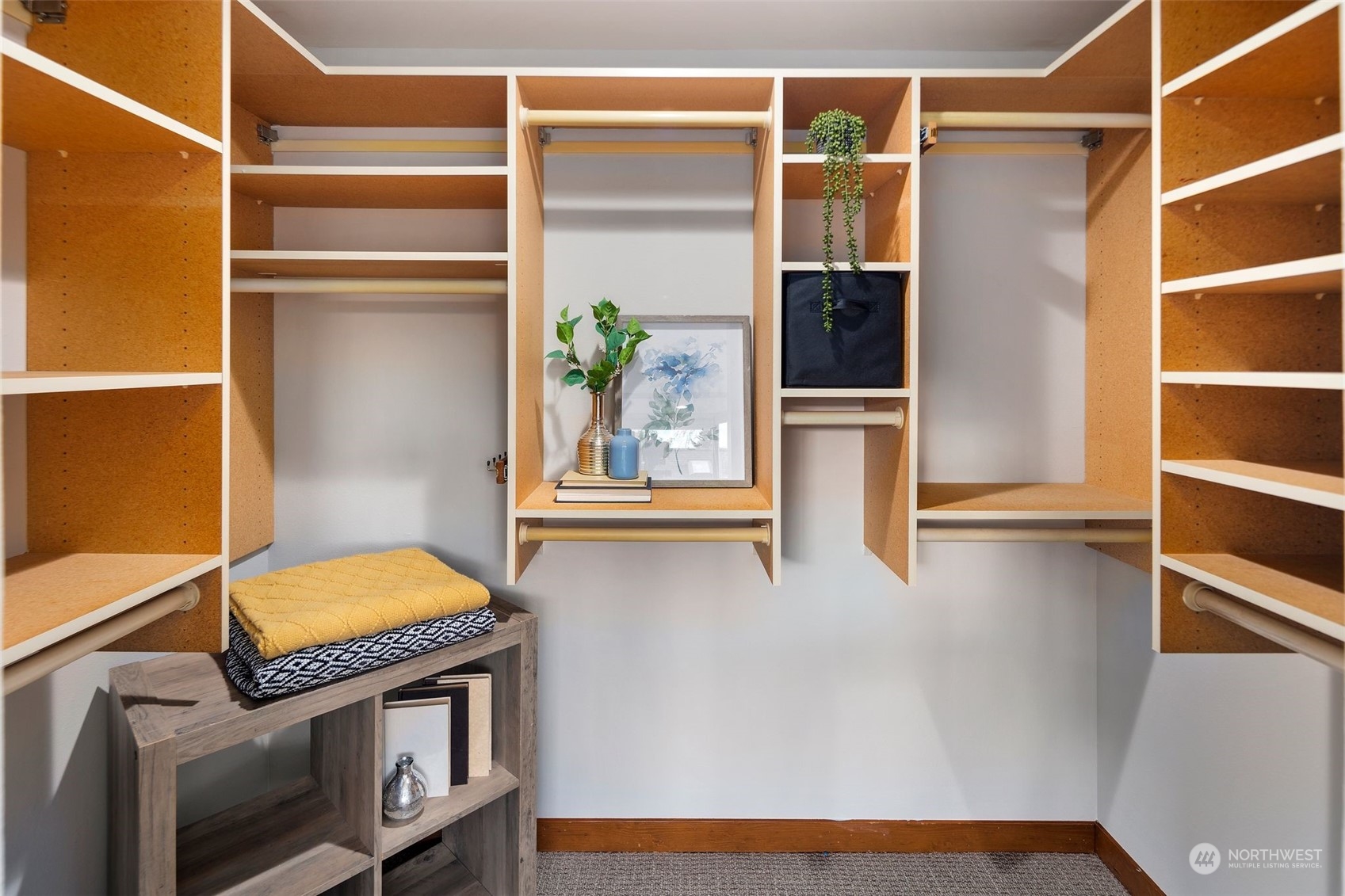 416 Daley Street, Unit C Edmonds, WA 98020 - Photo 18 of 38 a view of walk in closet with window and wooden floor