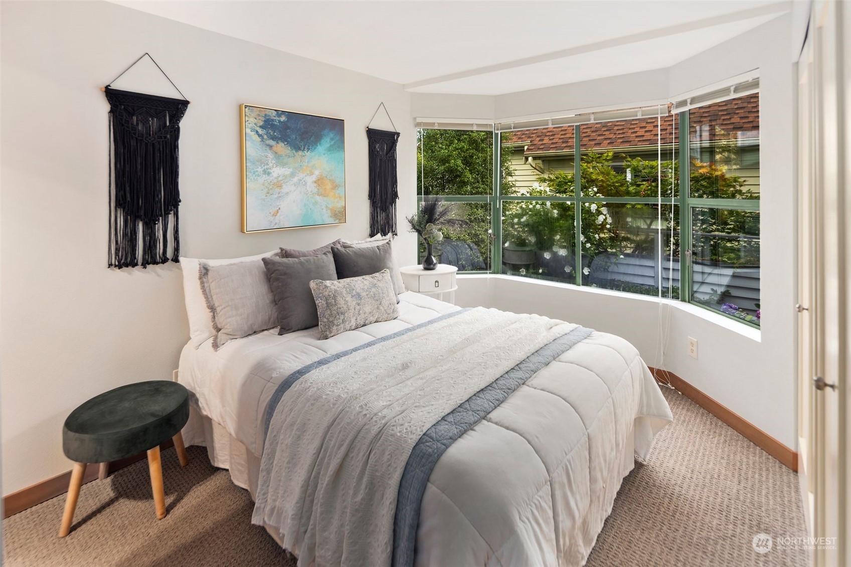 416 Daley Street, Unit C Edmonds, WA 98020 - Photo 19 of 38 a bedroom with a large bed and a window