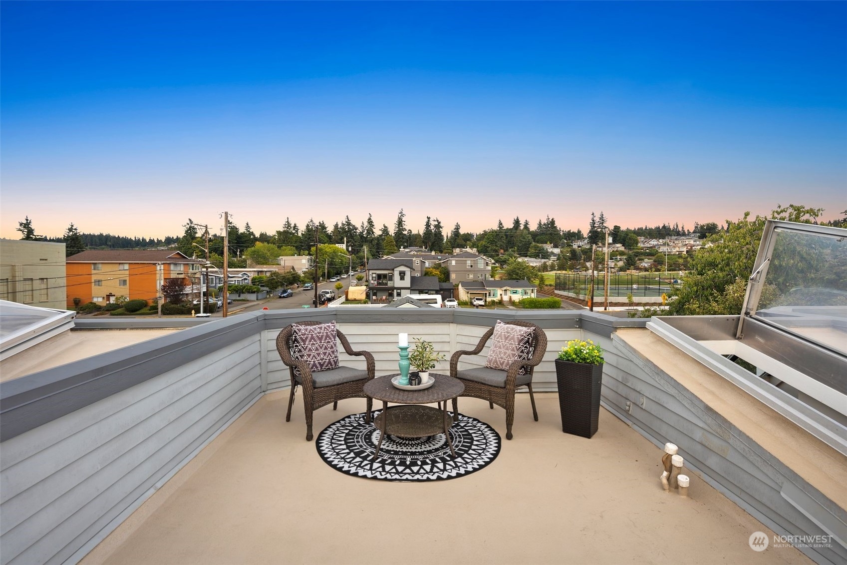 416 Daley Street, Unit C Edmonds, WA 98020 - Photo 23 of 38 a swimming pool with outdoor seating and a terrace