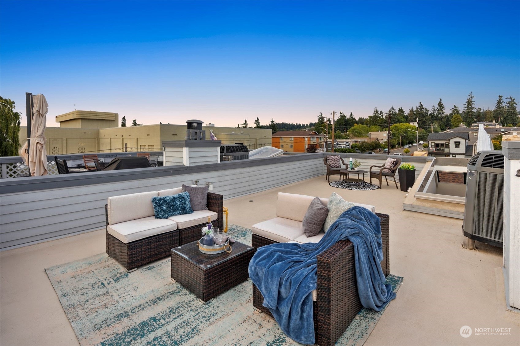 416 Daley Street, Unit C Edmonds, WA 98020 - Photo 25 of 38 a view of a roof deck with couches and potted plants