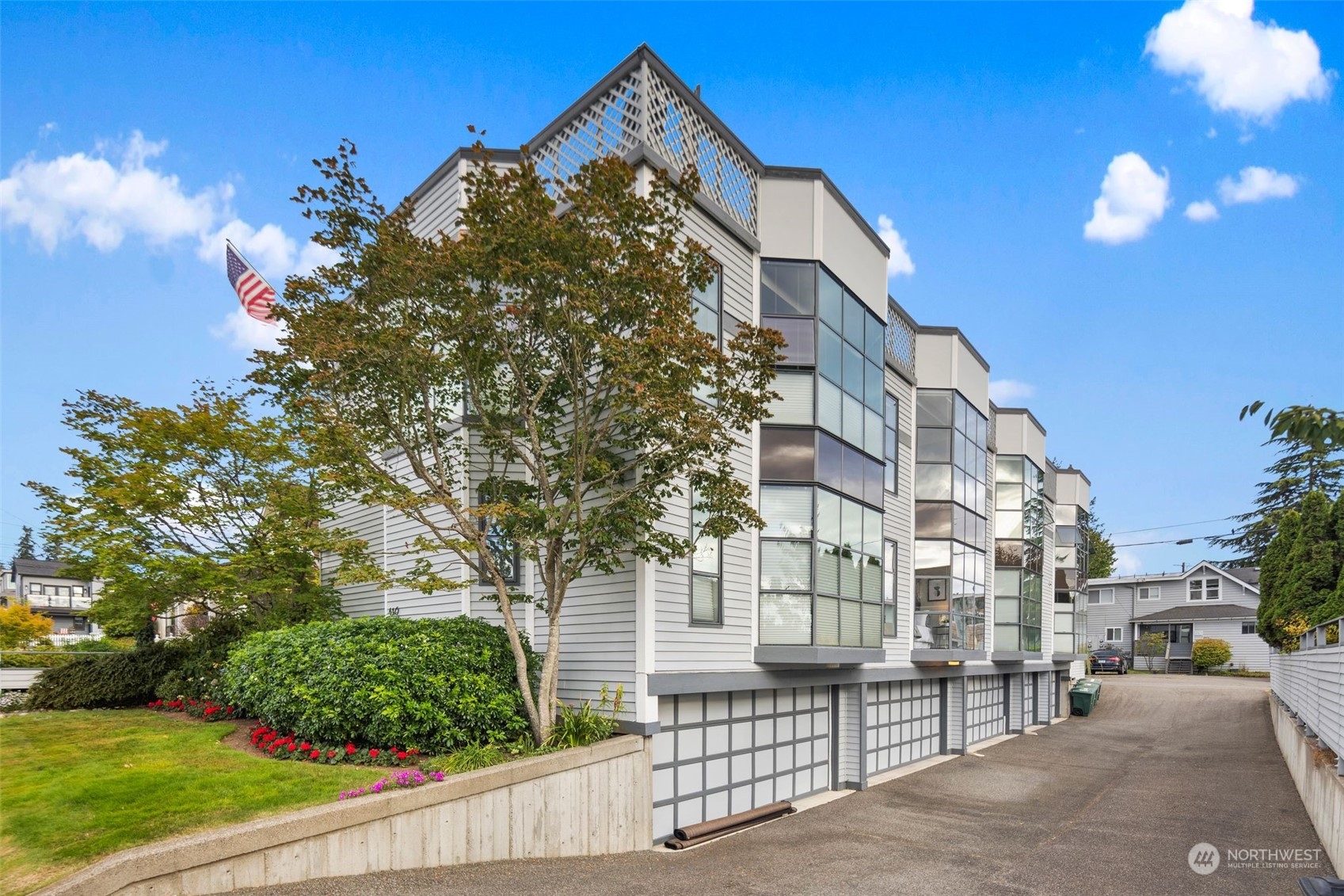 416 Daley Street, Unit C Edmonds, WA 98020 - Photo 3 of 38 a view of a house with a tree