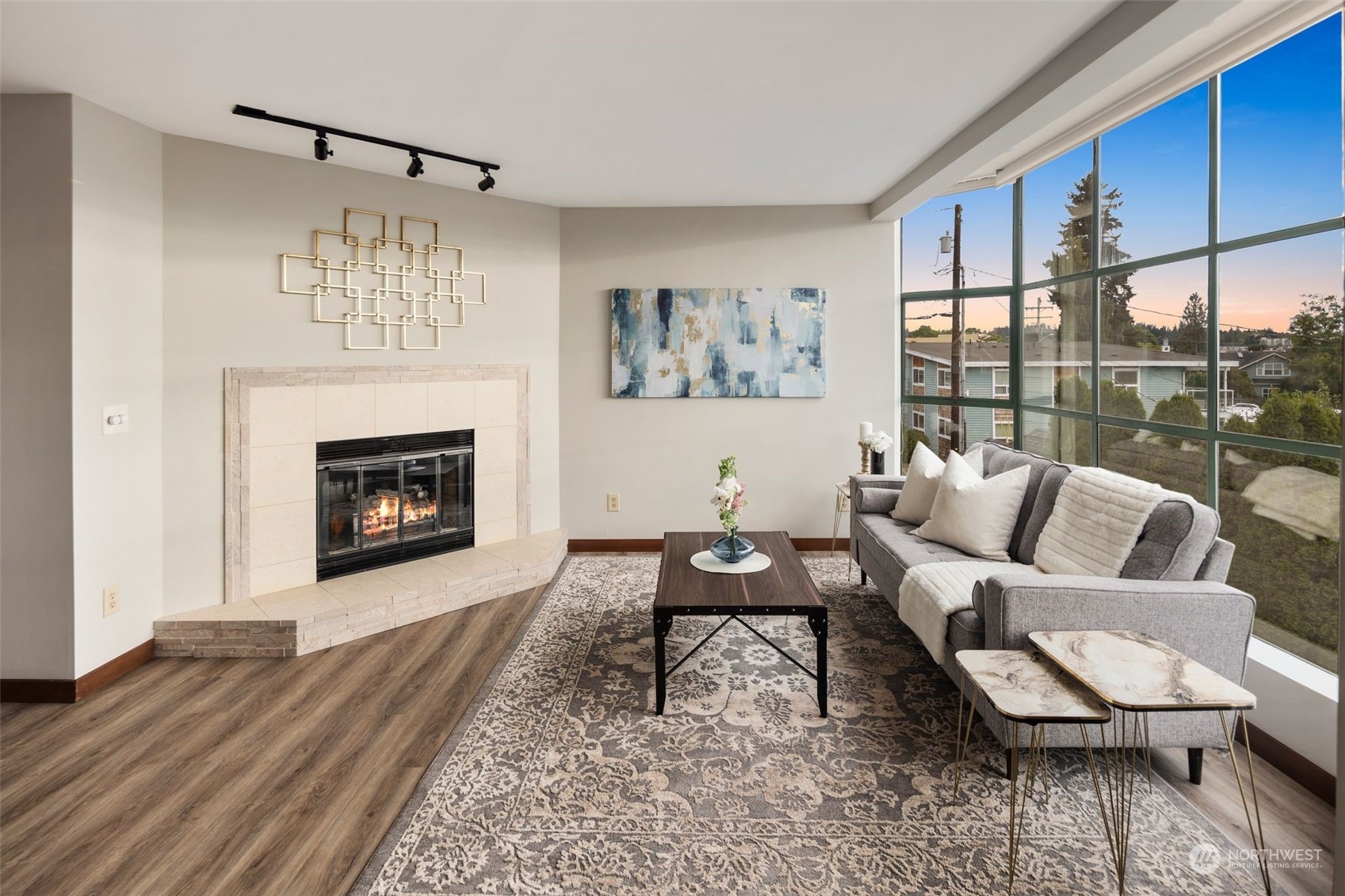416 Daley Street, Unit C Edmonds, WA 98020 - Photo 7 of 38 a living room with furniture large window and a fireplace