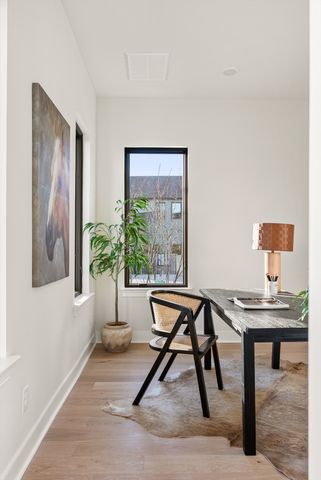 a bathroom with a granite countertop sink toilet mirror and bathtub