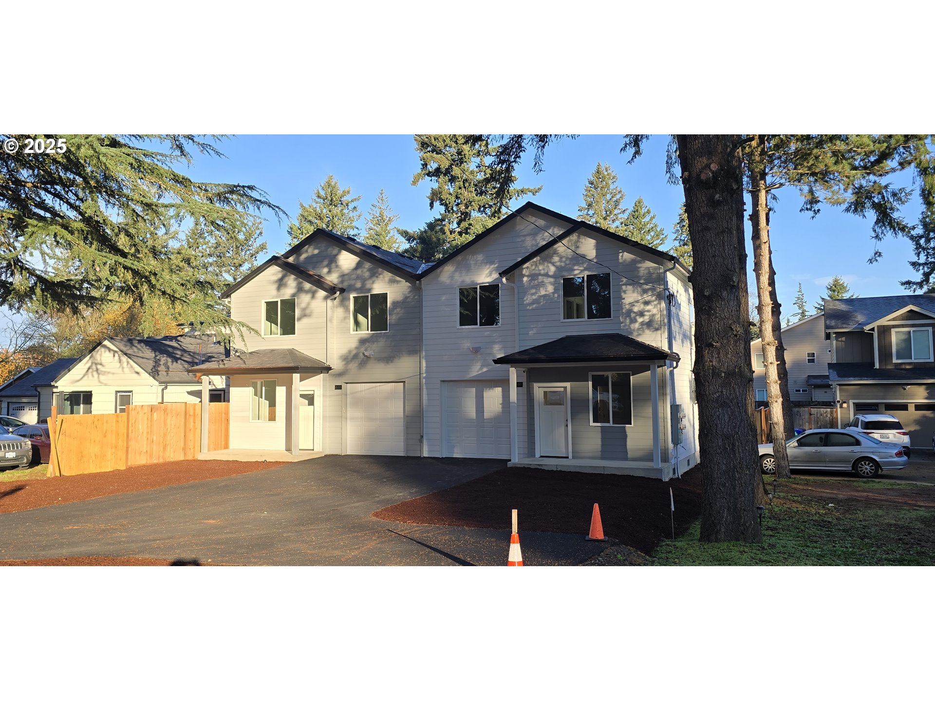 12451 Southeast Harold Street, Unit 1 Portland, OR 97236 - Photo 2 of 21 a view of a big building with many windows
