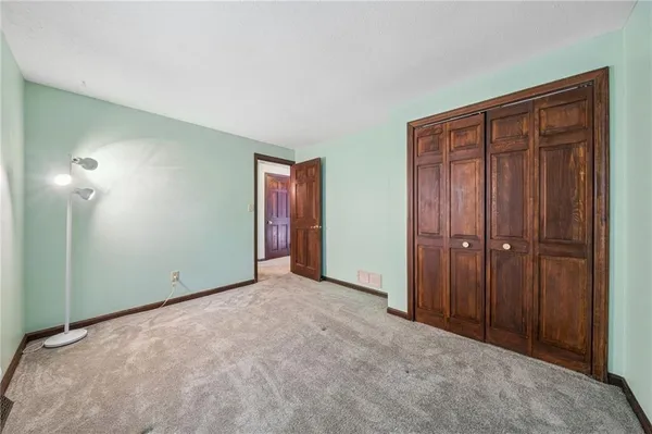 an empty room with closet