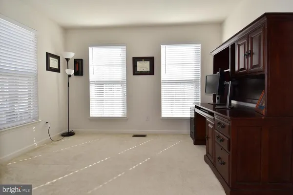 a kitchen with windows and dryer