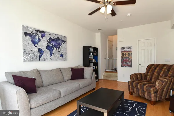 a living room with furniture and a couch