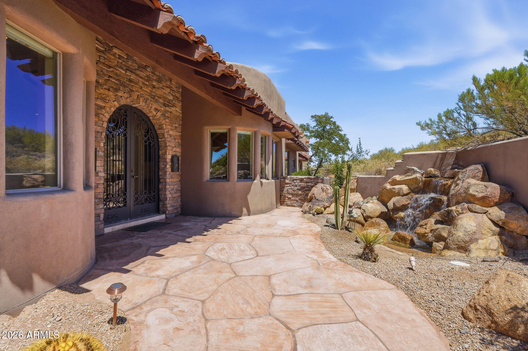 38211 North Sombrero Road Carefree, AZ 85377 - Photo 1 of 50 a view of a house with a patio