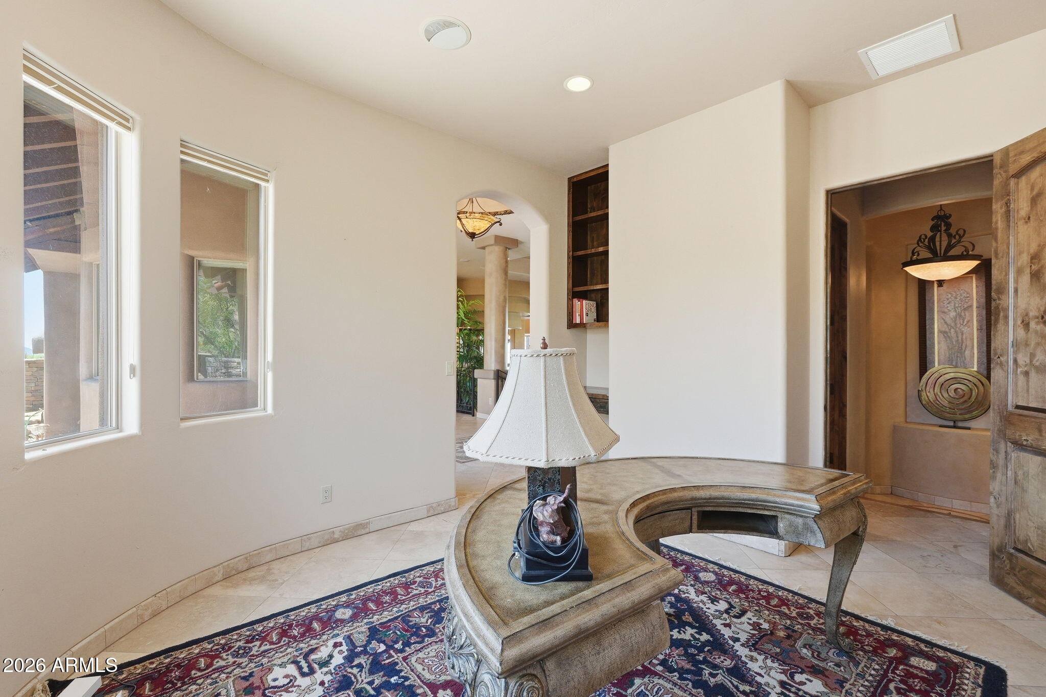 38211 North Sombrero Road Carefree, AZ 85377 - Photo 16 of 50 a living room with furniture and a window