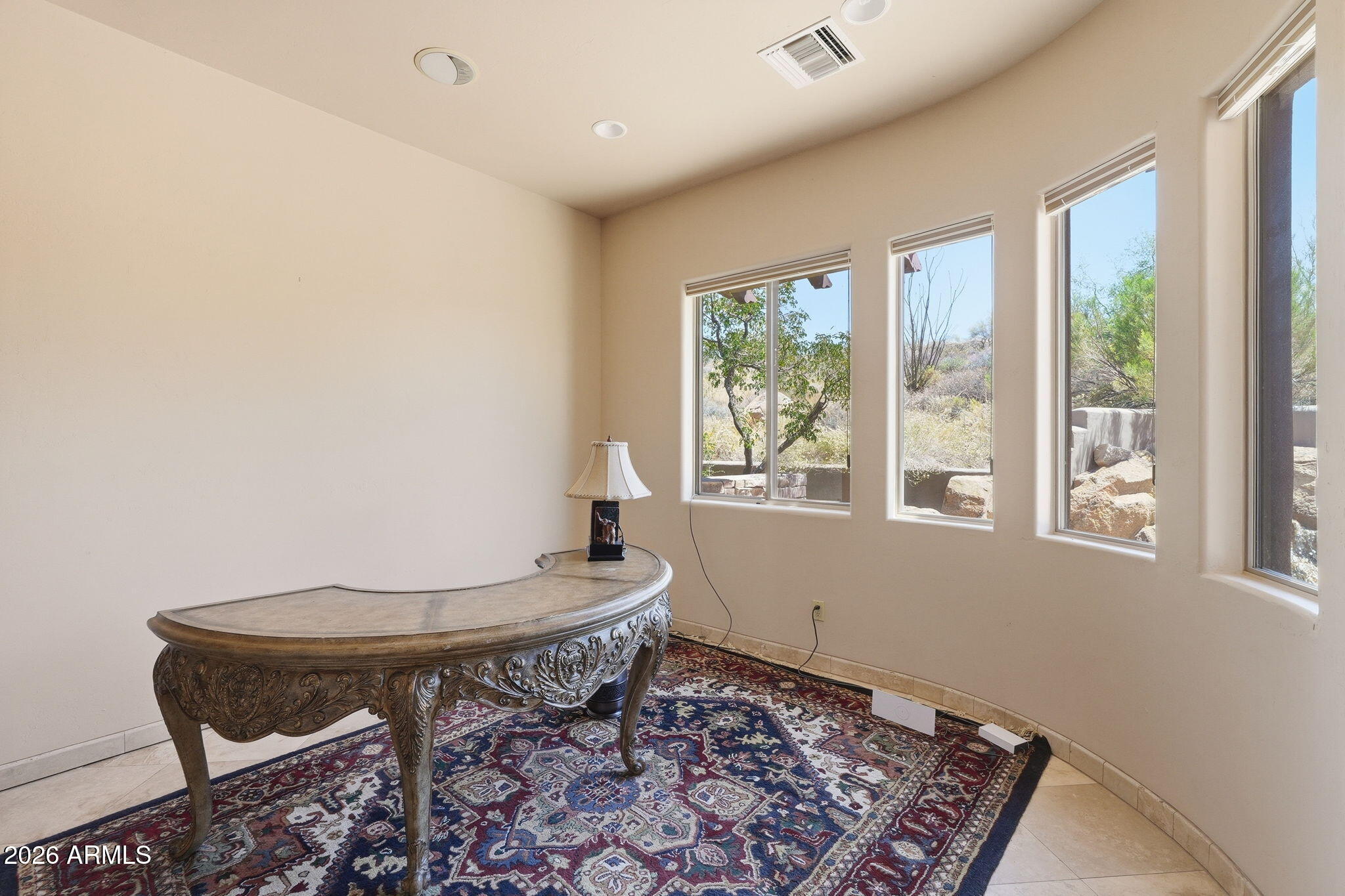38211 North Sombrero Road Carefree, AZ 85377 - Photo 17 of 50 a room with chairs and a window