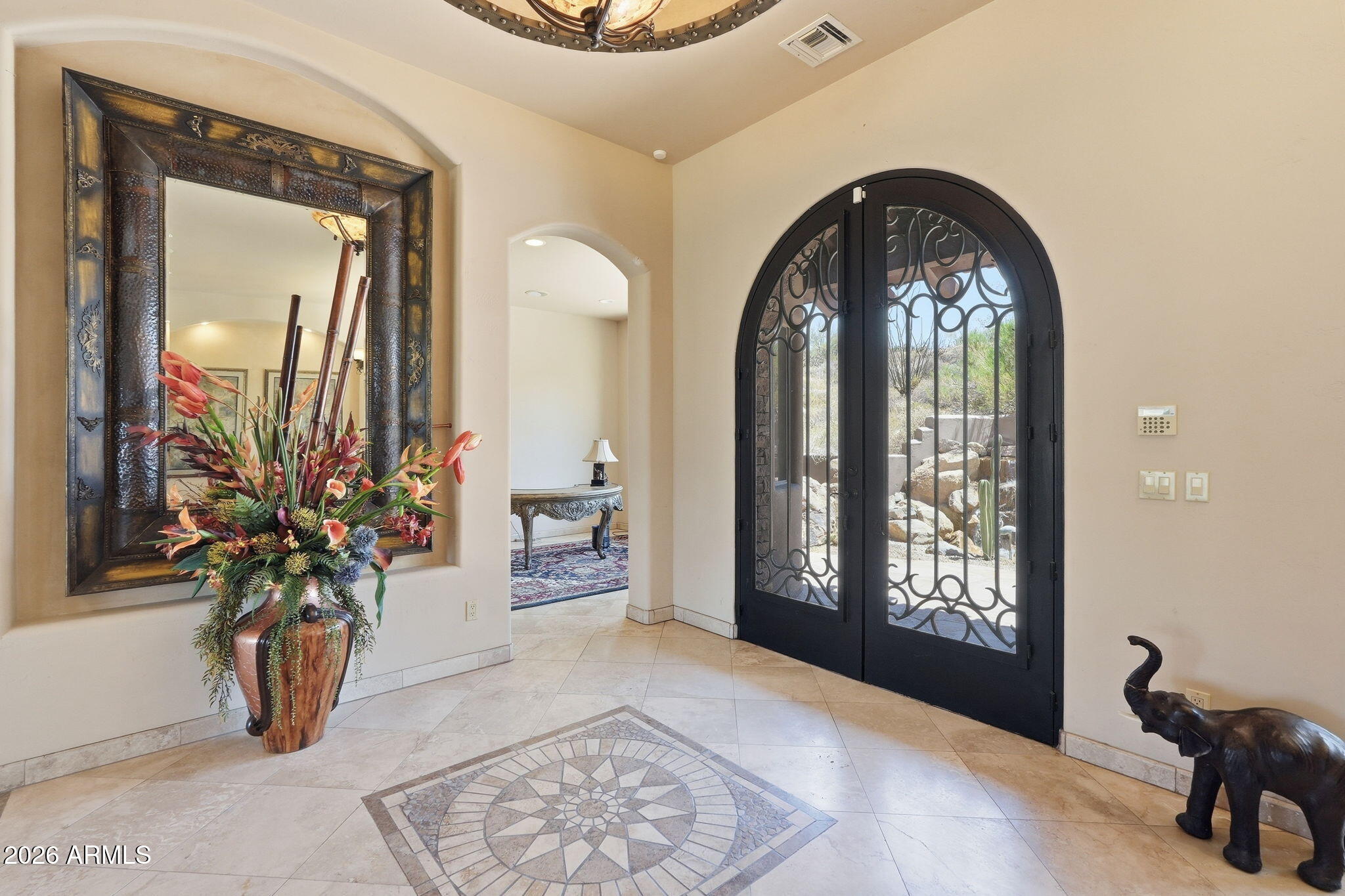 38211 North Sombrero Road Carefree, AZ 85377 - Photo 2 of 50 a view of entryway with livingroom and potted plant