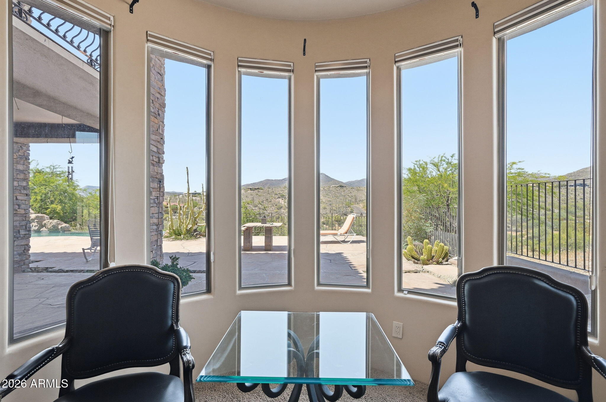 38211 North Sombrero Road Carefree, AZ 85377 - Photo 22 of 50 a living room with furniture and a window