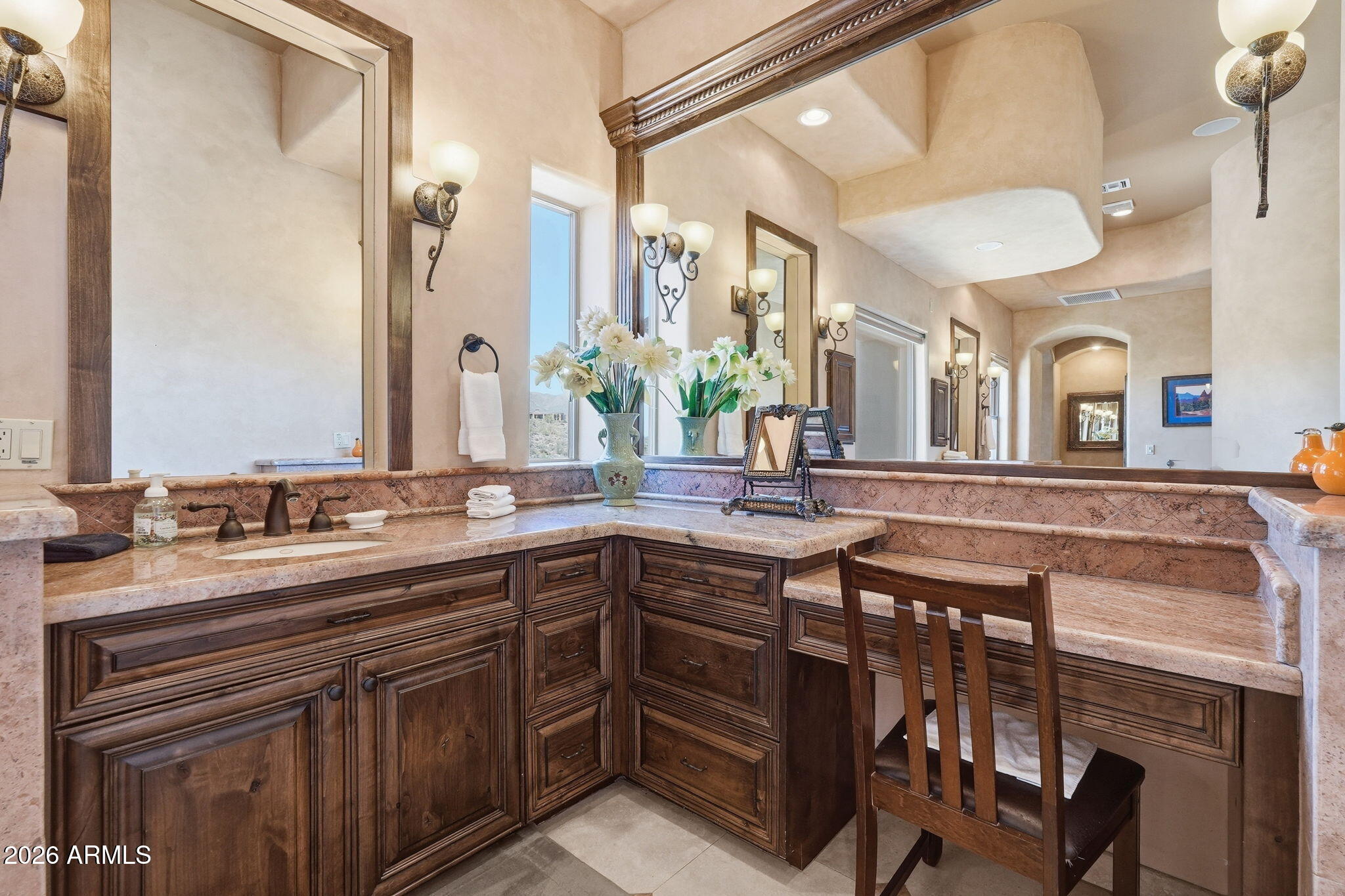 38211 North Sombrero Road Carefree, AZ 85377 - Photo 24 of 50 a spacious bathroom with a double vanity sink and a mirror