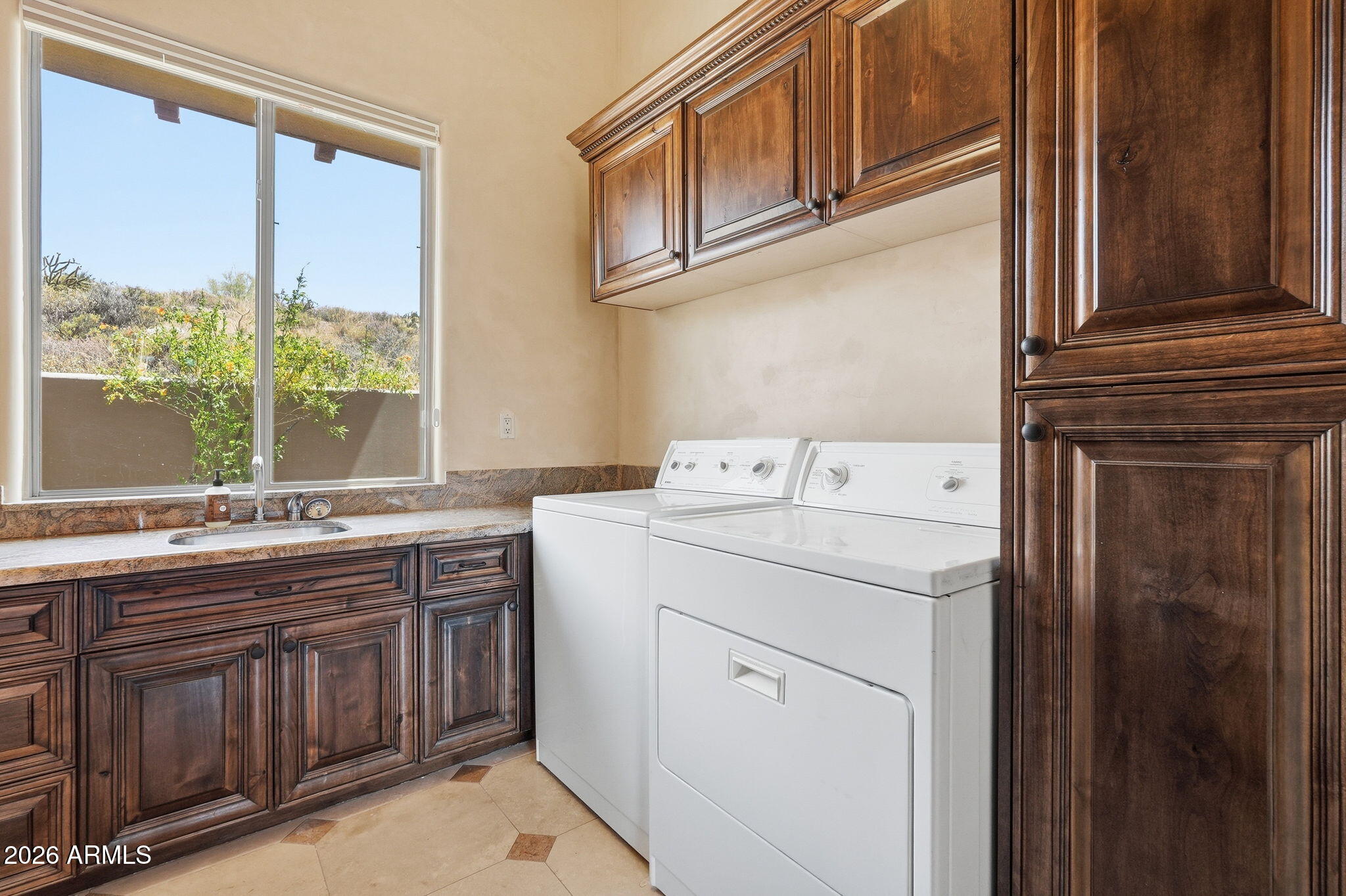 38211 North Sombrero Road Carefree, AZ 85377 - Photo 27 of 50 a utility room with dryer and washer