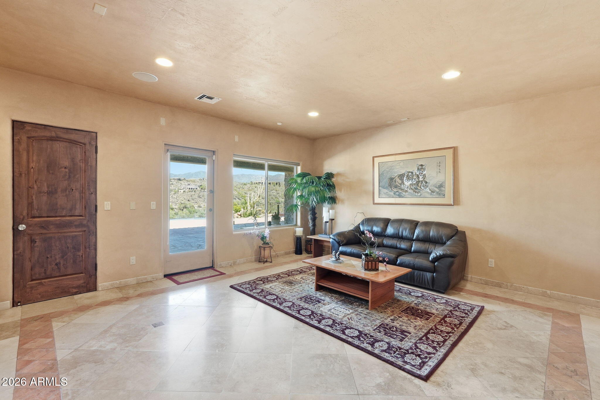 38211 North Sombrero Road Carefree, AZ 85377 - Photo 32 of 50 a living room with furniture and a window