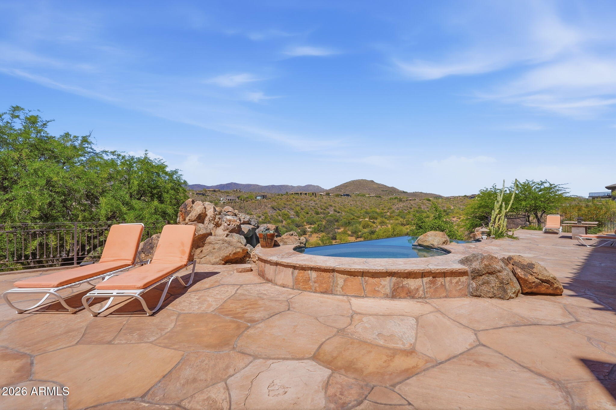 38211 North Sombrero Road Carefree, AZ 85377 - Photo 41 of 50 a view of a terrace with a garden