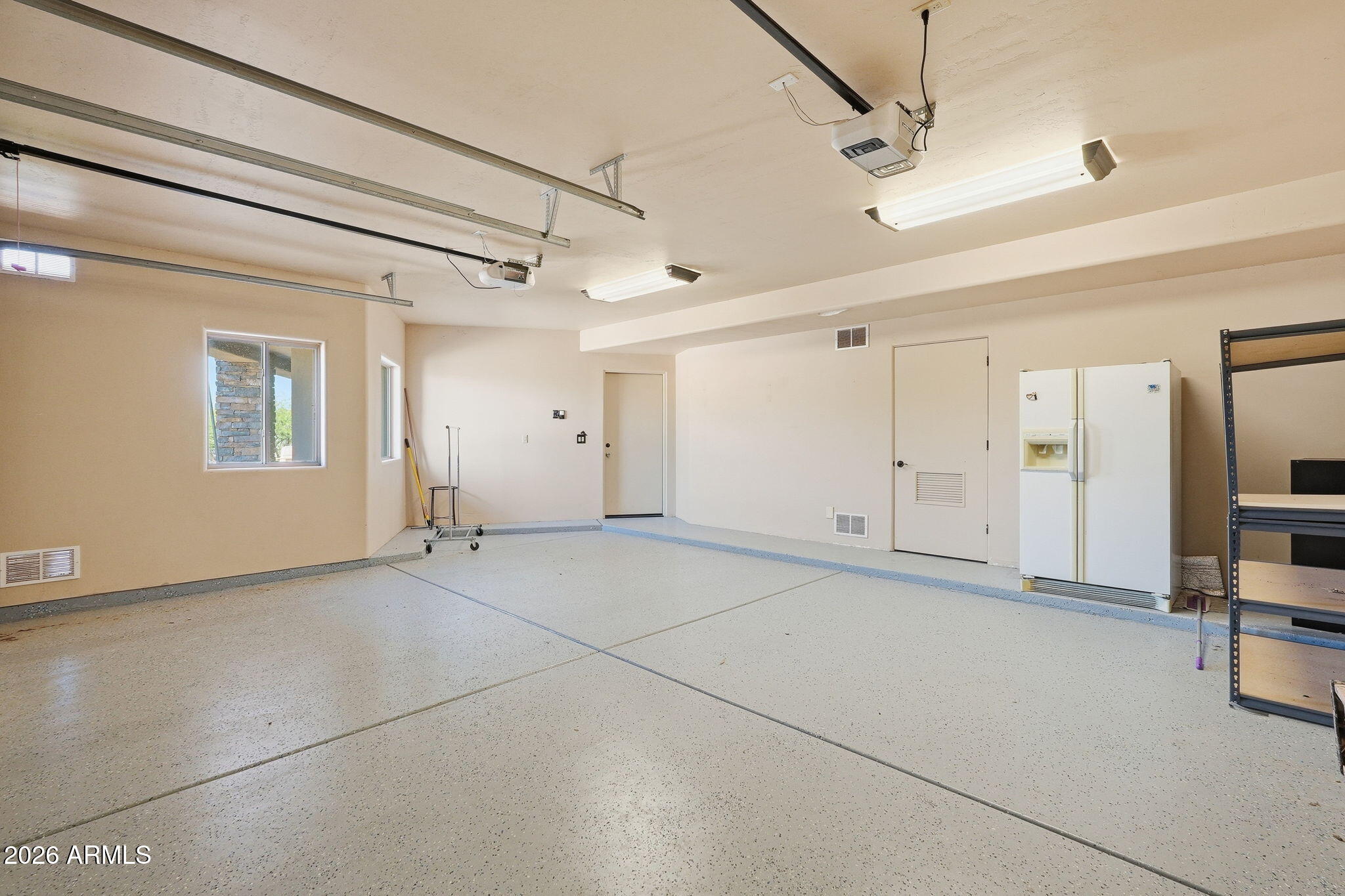 38211 North Sombrero Road Carefree, AZ 85377 - Photo 46 of 50 a view of an empty room with a window