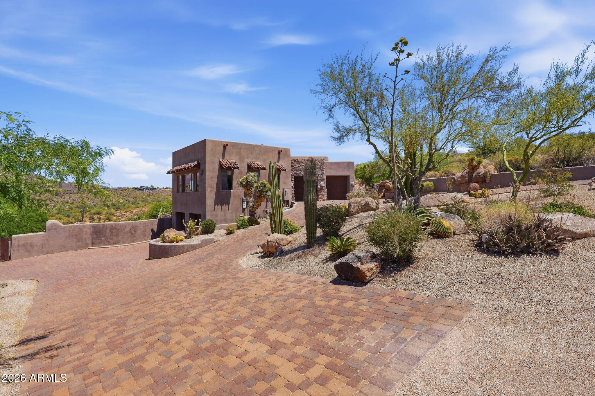 38211 North Sombrero Road Carefree, AZ 85377 - Photo 48 of 50 a view of a backyard with a garden