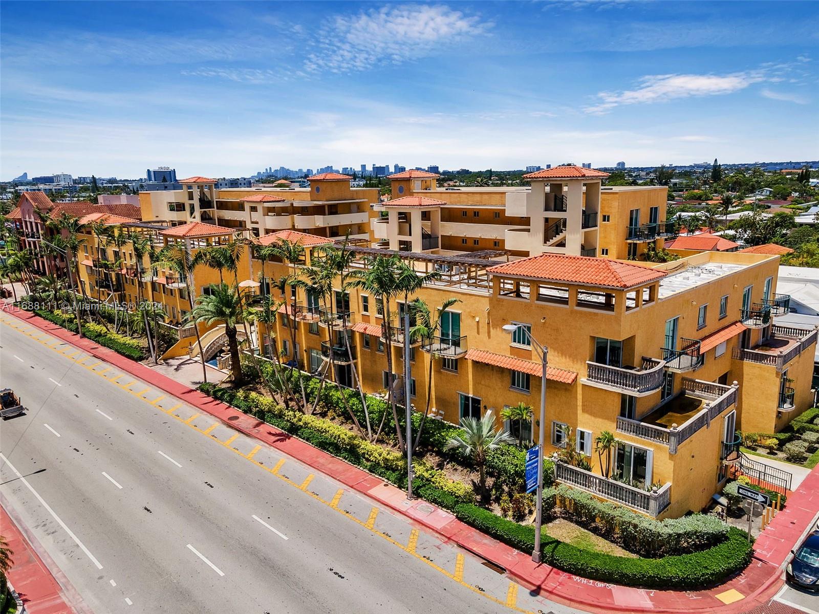 8888 Collins Avenue, Unit 113 Surfside, FL 33154 - Photo 1 of 14 a view of a city with tall buildings