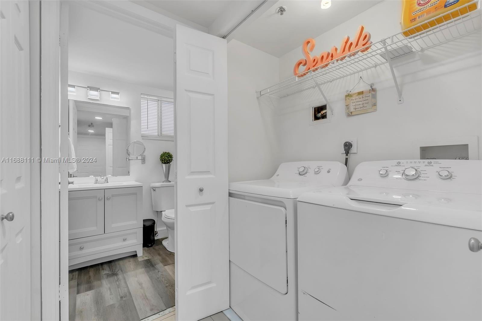 8888 Collins Avenue, Unit 113 Surfside, FL 33154 - Photo 10 of 14 a view of bathroom with dual sinks