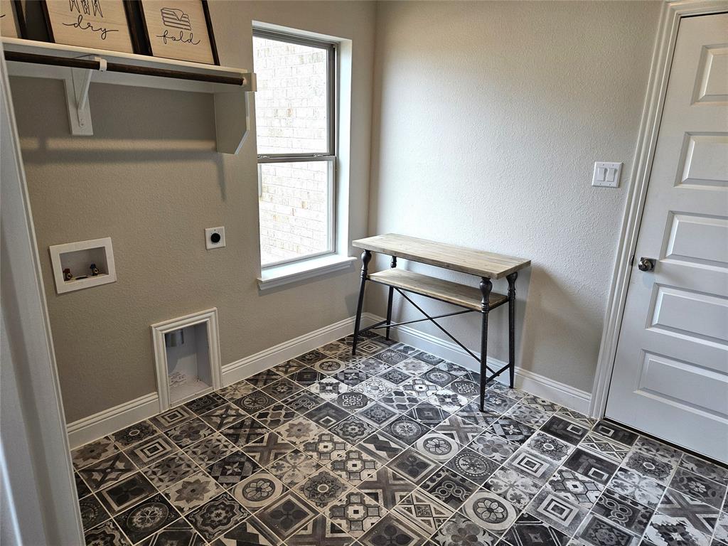 241 Blythe Road Van Alstyne, TX 75495 - Photo 14 of 37 a bench sitting in a room next to a window