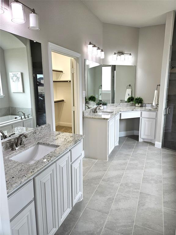 241 Blythe Road Van Alstyne, TX 75495 - Photo 17 of 37 a kitchen with a sink stove and cabinets