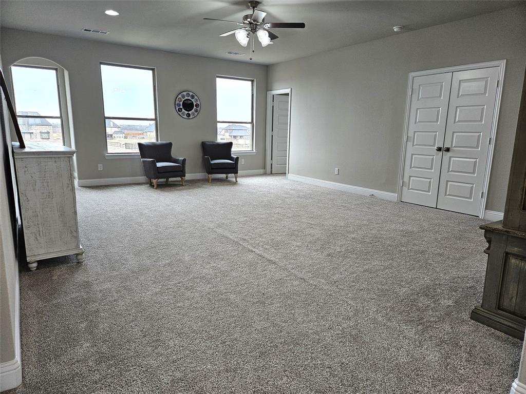 241 Blythe Road Van Alstyne, TX 75495 - Photo 23 of 37 a living room with furniture and a large window