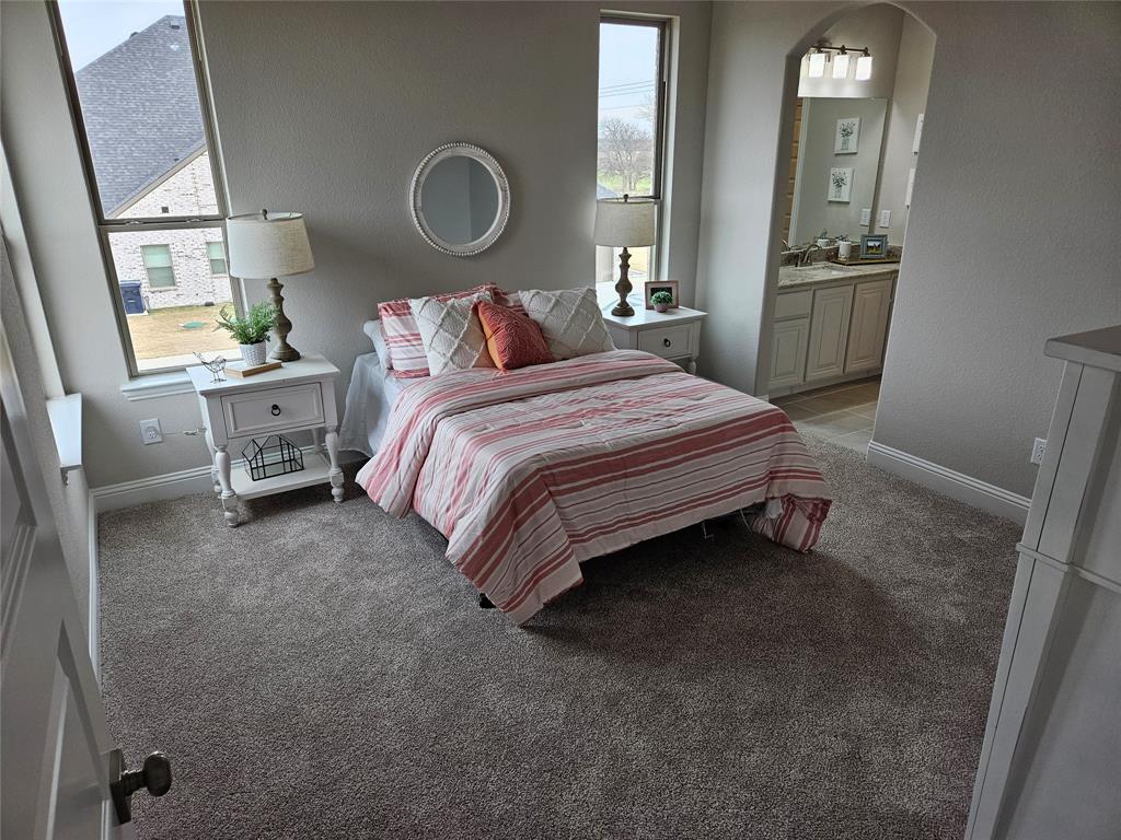 241 Blythe Road Van Alstyne, TX 75495 - Photo 29 of 37 a bedroom with a bed and window