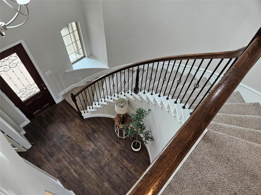241 Blythe Road Van Alstyne, TX 75495 - Photo 35 of 37 a view of staircase with wooden floor