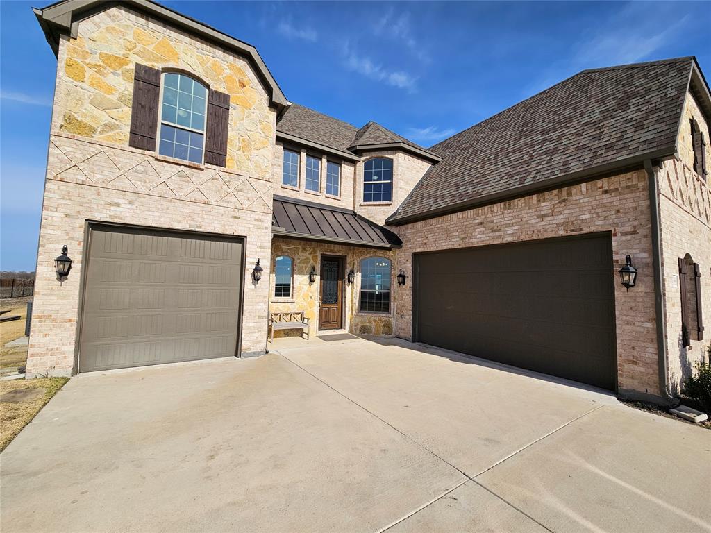 241 Blythe Road Van Alstyne, TX 75495 - Photo 37 of 37 a front view of a house with a garage