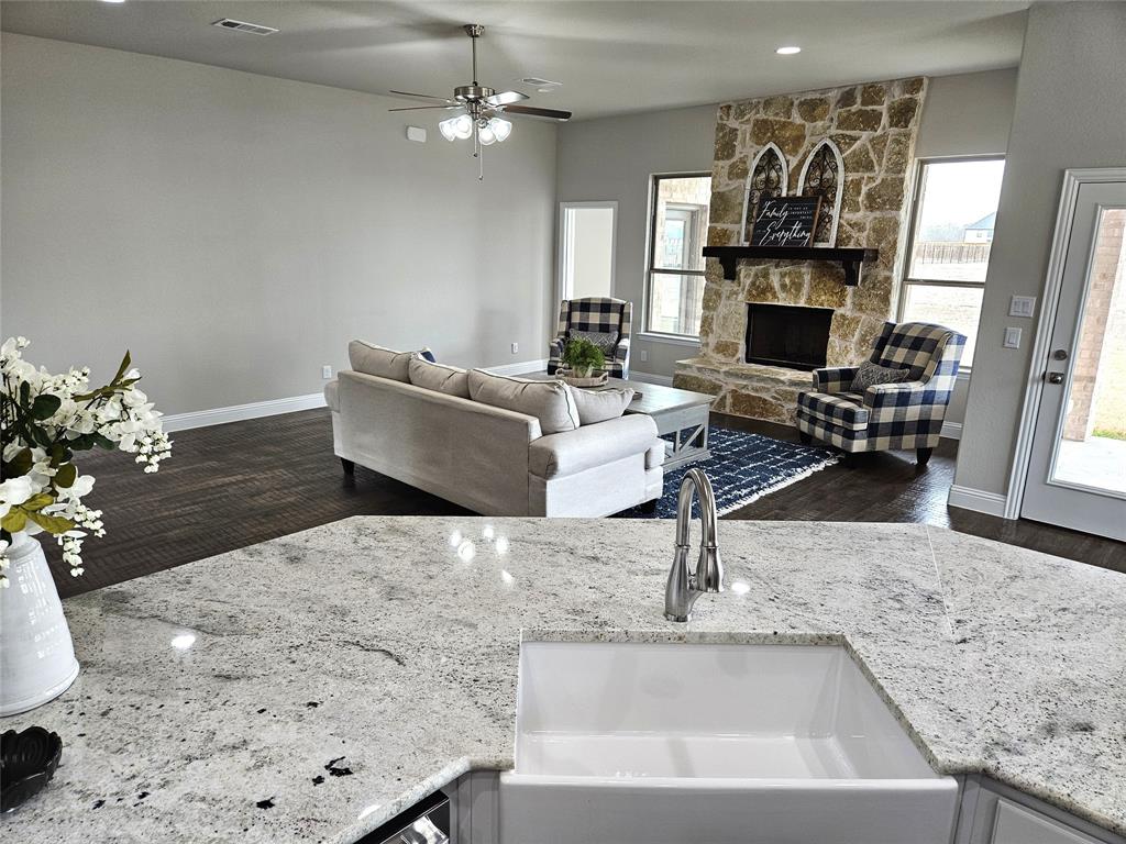 241 Blythe Road Van Alstyne, TX 75495 - Photo 6 of 37 a living room with furniture and a flat screen tv