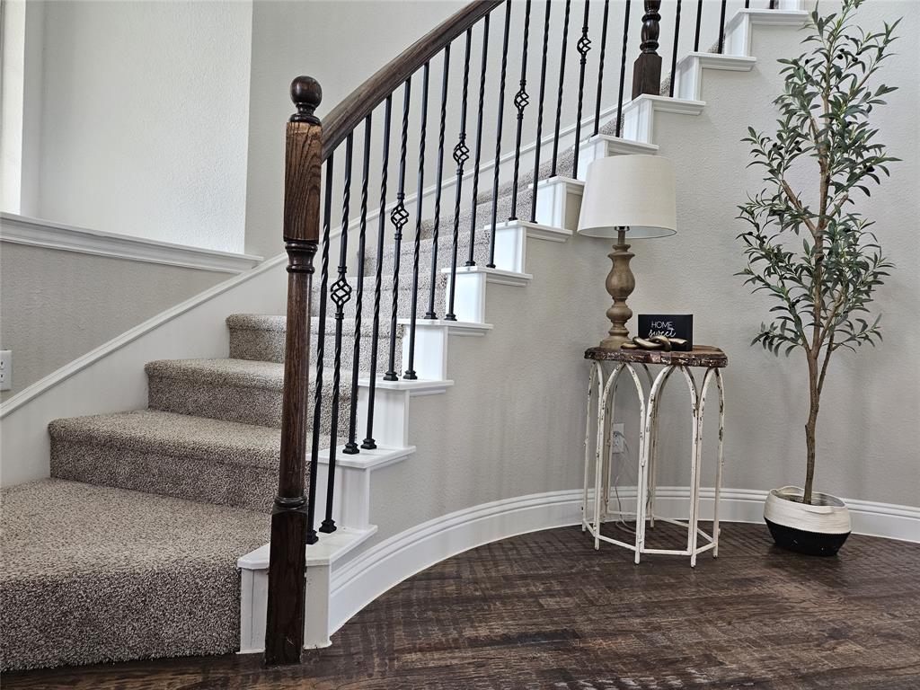 241 Blythe Road Van Alstyne, TX 75495 - Photo 7 of 37 a view of entryway with wooden floor and stairs