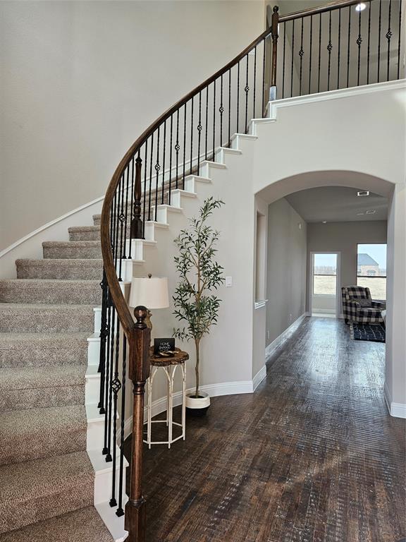 241 Blythe Road Van Alstyne, TX 75495 - Photo 8 of 37 a view of entryway and hall with wooden floor