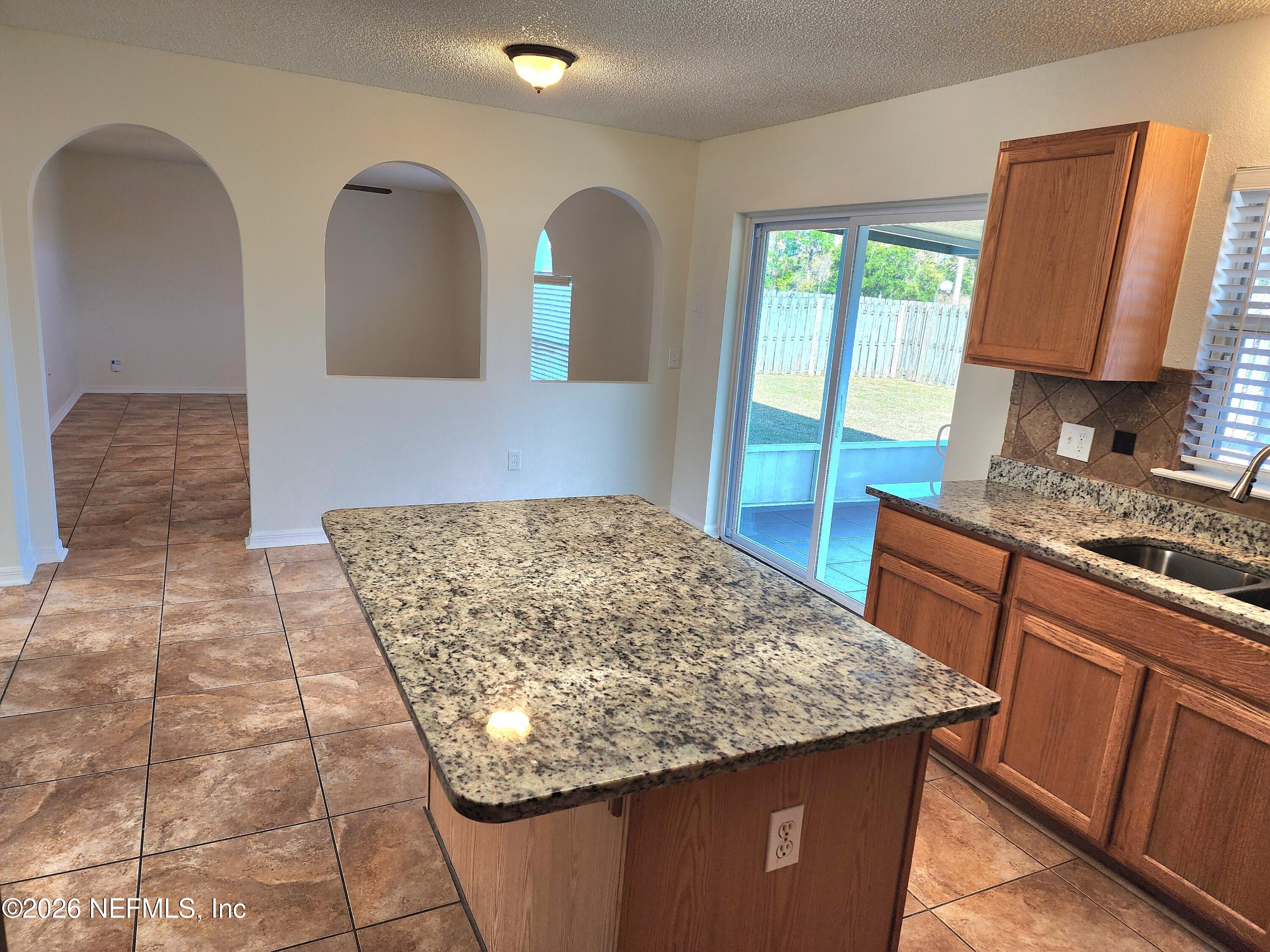 7147 High Bluff Road Jacksonville, FL 32244 - Photo 3 of 16 kitchen& family