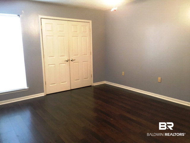 1128 North Alston Street, Unit 1128 Foley, AL 36535 - Photo 13 of 24 Master Bedroom