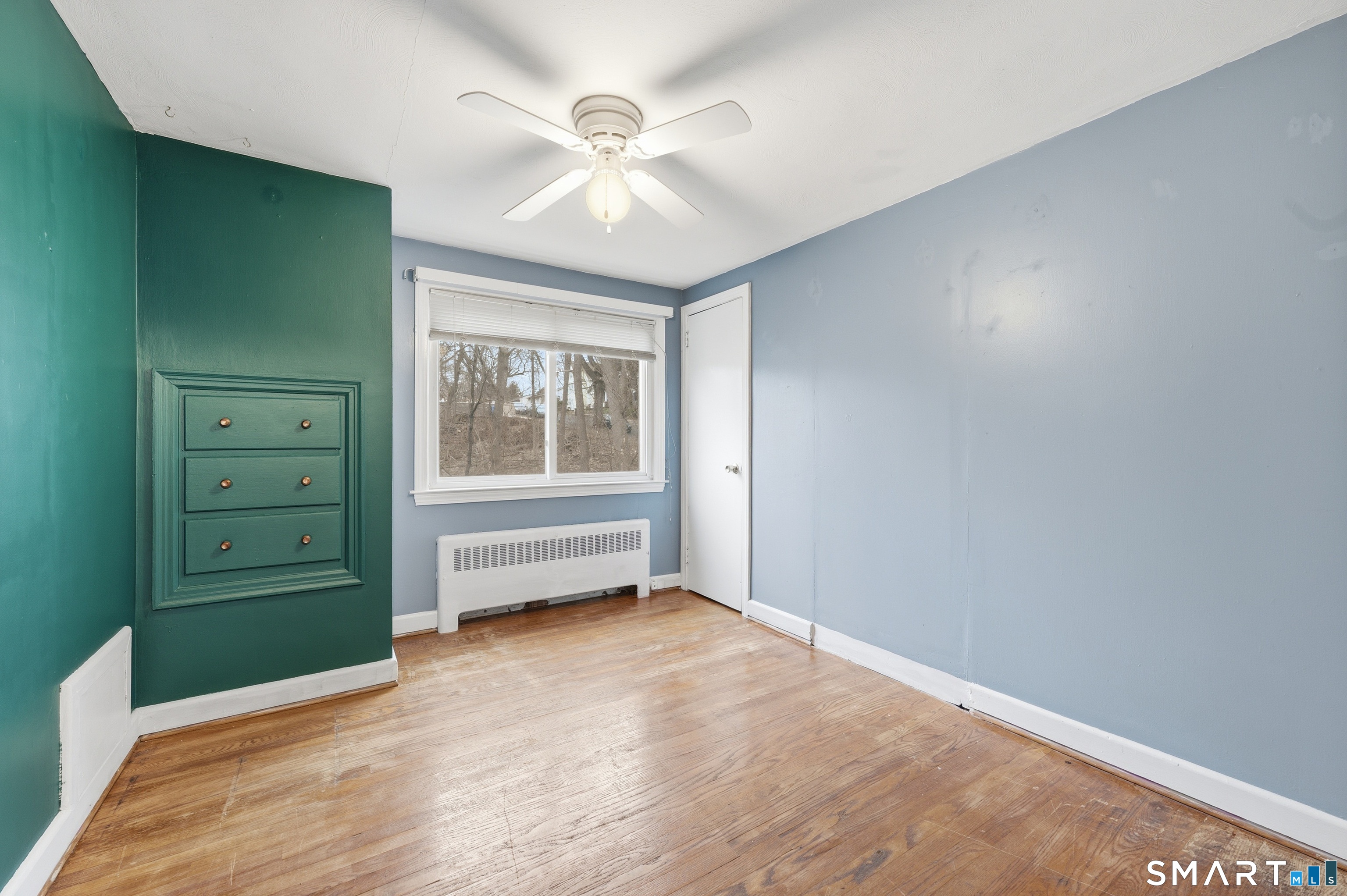 71 Hatch Street New Britain, CT 06053 - Photo 23 of 34 an empty room with windows and closet