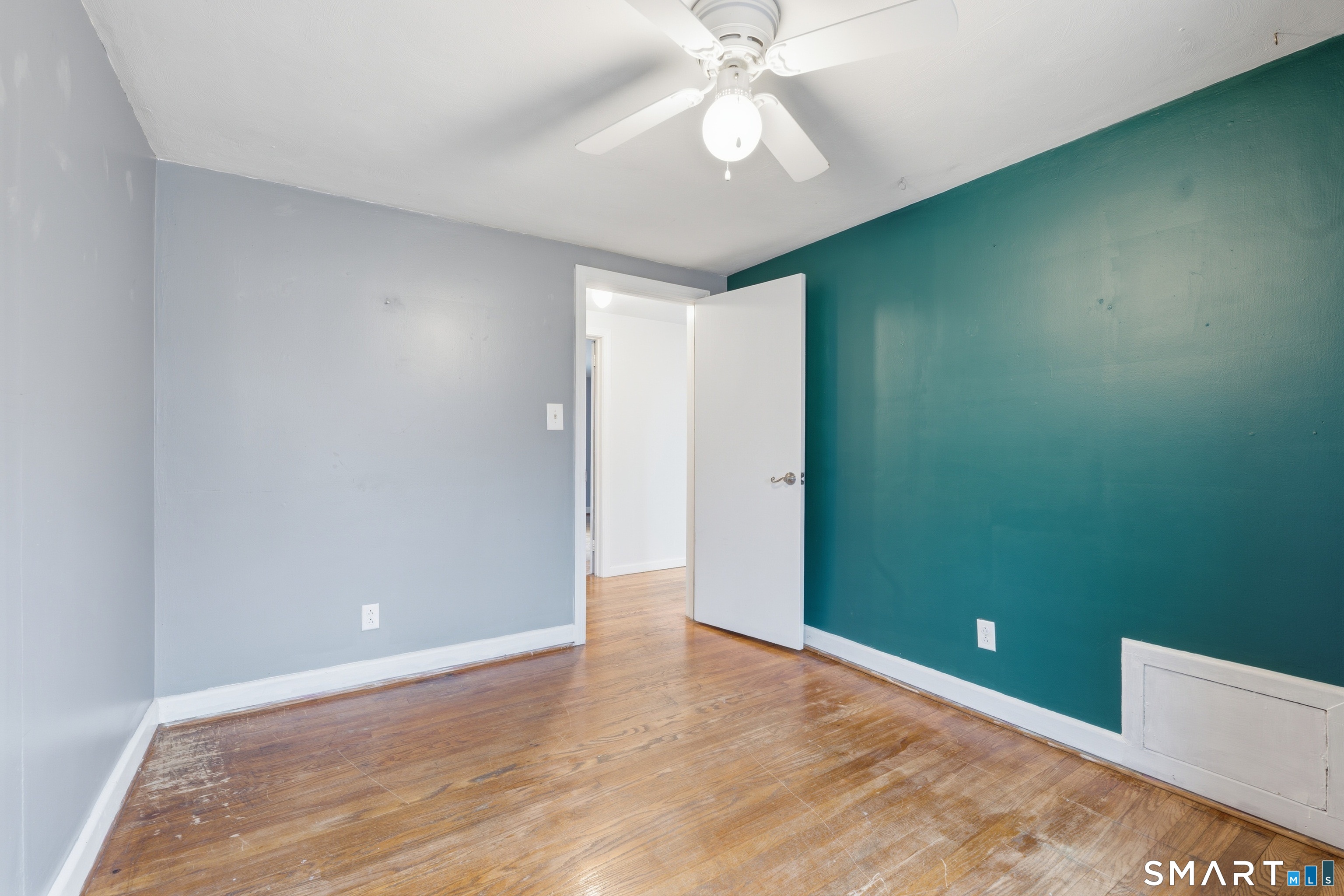 71 Hatch Street New Britain, CT 06053 - Photo 24 of 34 an empty room with a fan & a fan