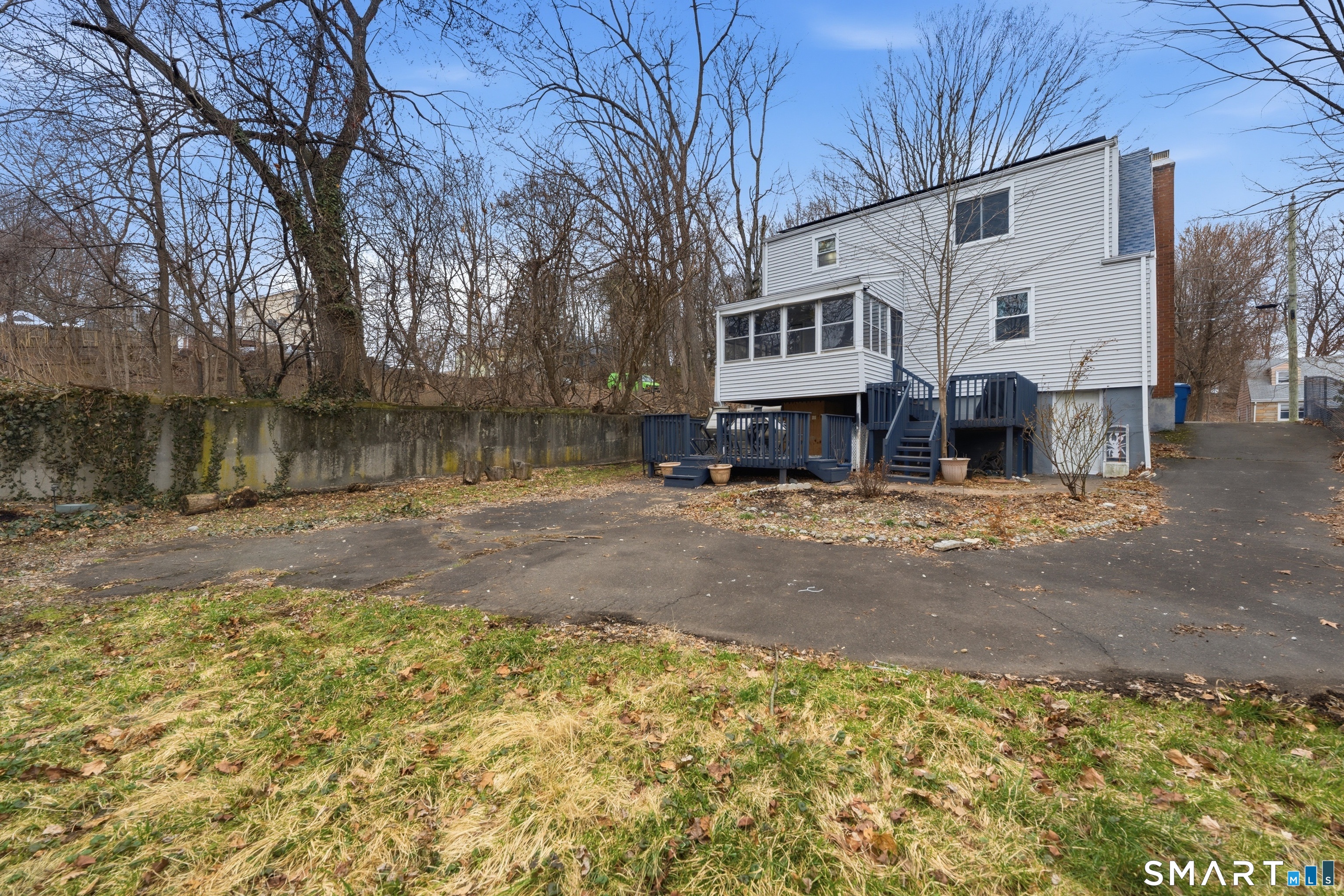 71 Hatch Street New Britain, CT 06053 - Photo 29 of 34 a view of a white house with a large tree