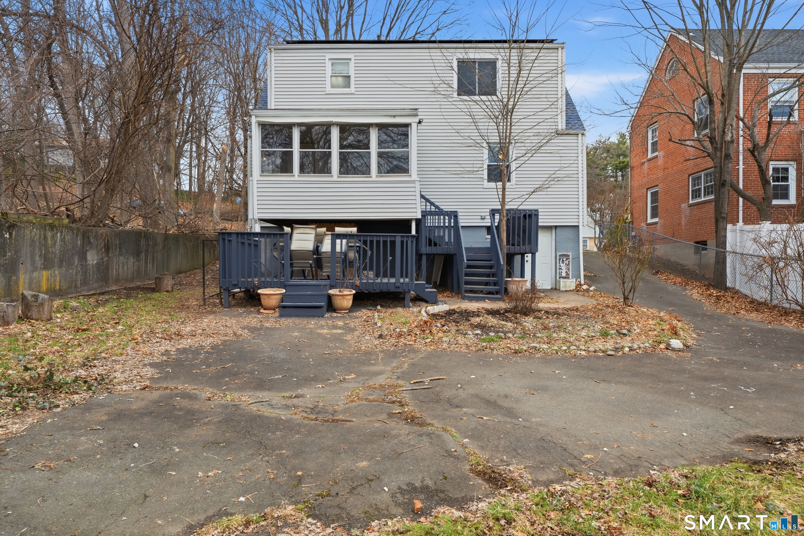71 Hatch Street New Britain, CT 06053 - Photo 31 of 34 a front view of a house with a yard