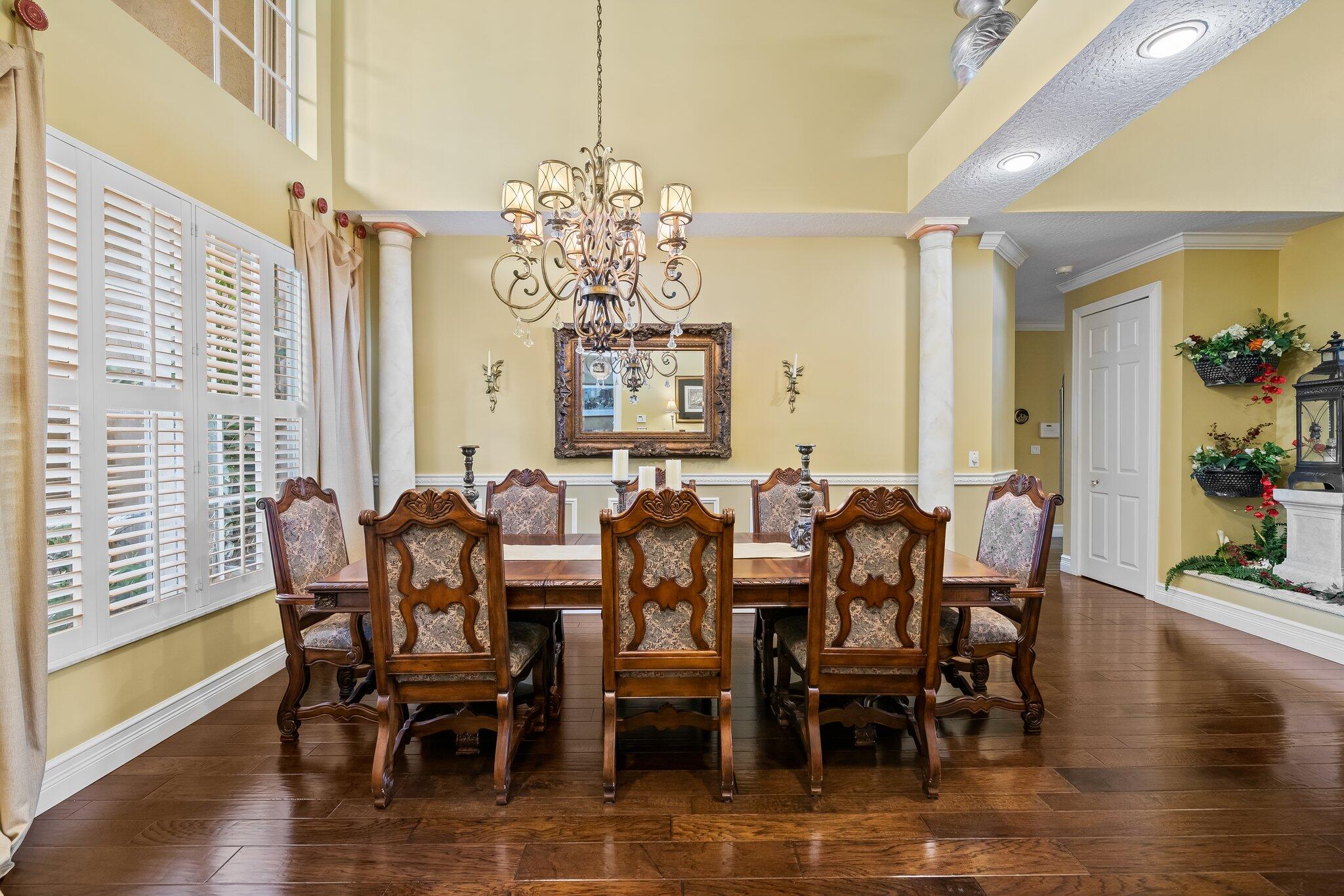 21167 Falls Ridge Way Boca Raton, FL 33428 - Photo 15 of 72 a view of a dining room with furniture window and wooden floor