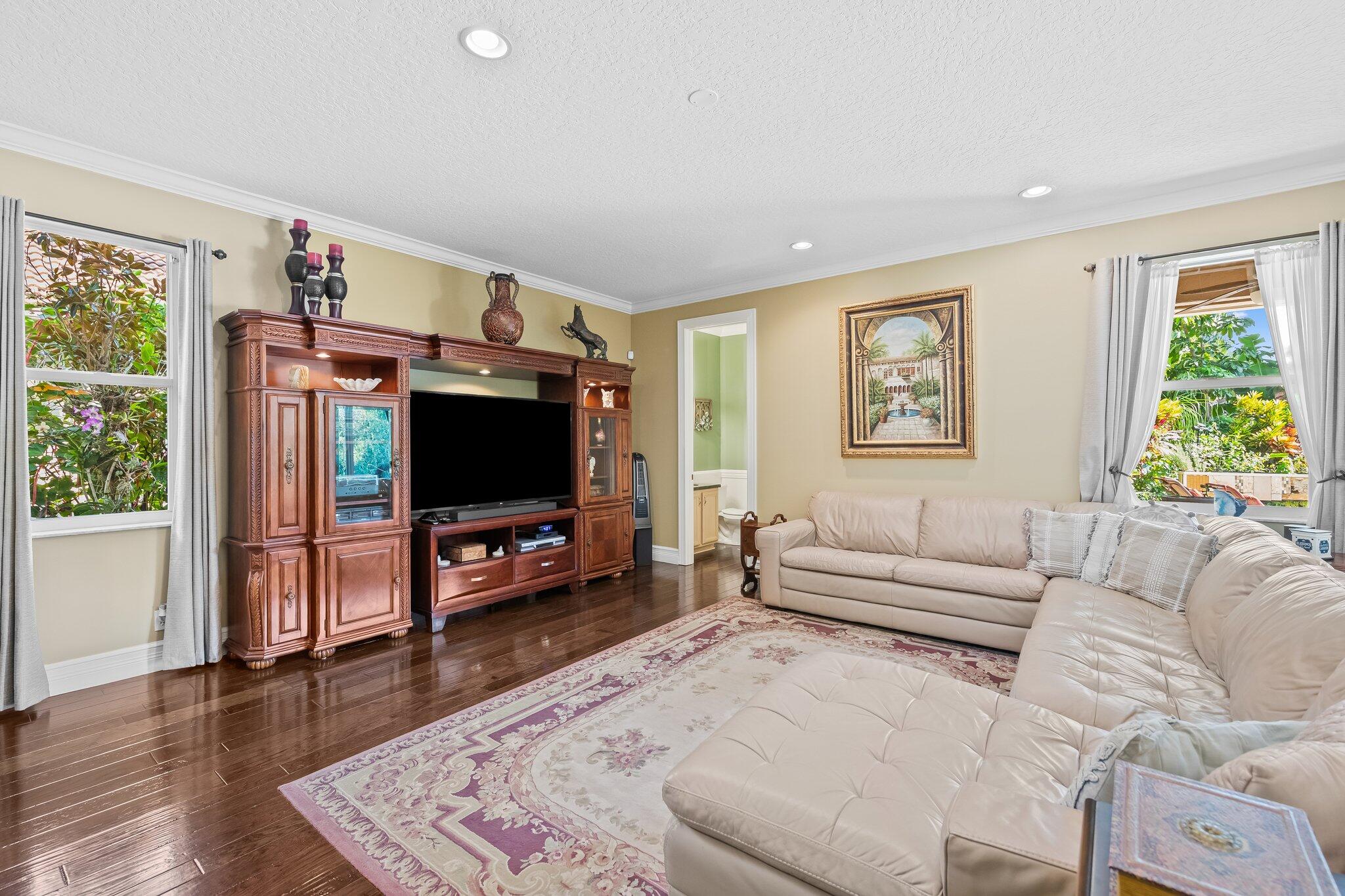 21167 Falls Ridge Way Boca Raton, FL 33428 - Photo 21 of 72 a living room with furniture and a flat screen tv