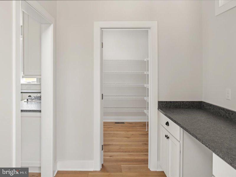 1 Groveland Road Pipersville, PA 18947 - Photo 17 of 65 a kitchen with white cabinets and a sink