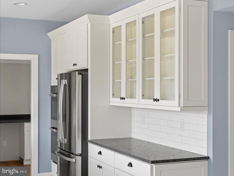 1 Groveland Road Pipersville, PA 18947 - Photo 30 of 65 a kitchen with stainless steel appliances granite countertop a refrigerator and a stove