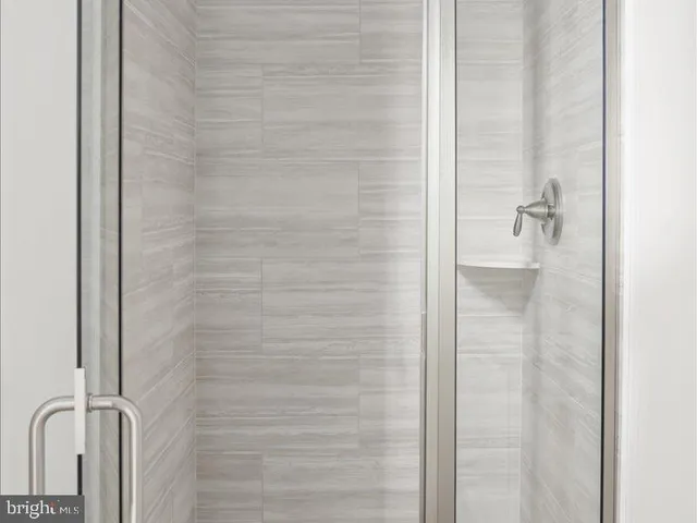 a kitchen with granite countertop cabinets sink and window