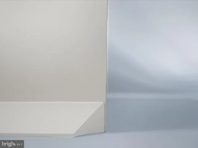 a view of small space with racks on the wall