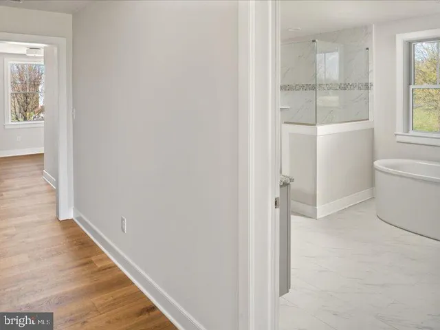 a bathroom with a sink and a window