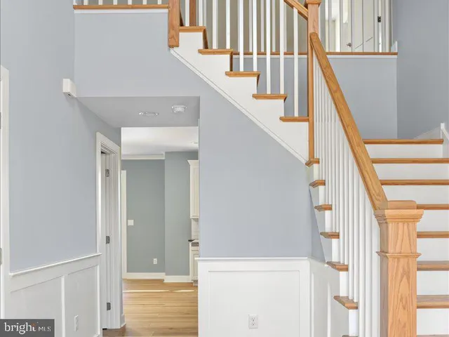 a view of livingroom with furniture and front door