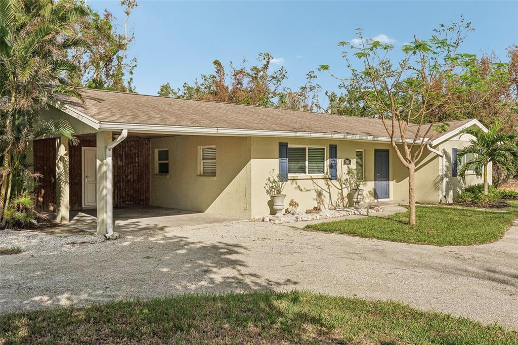 500 Pameto Road Nokomis, FL 34275 - Photo 5 of 45 Front elevation and carport